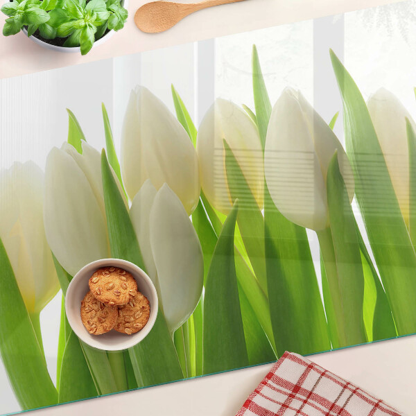 Üveg vágódeszka Tulipánok zöld levelek hátterében