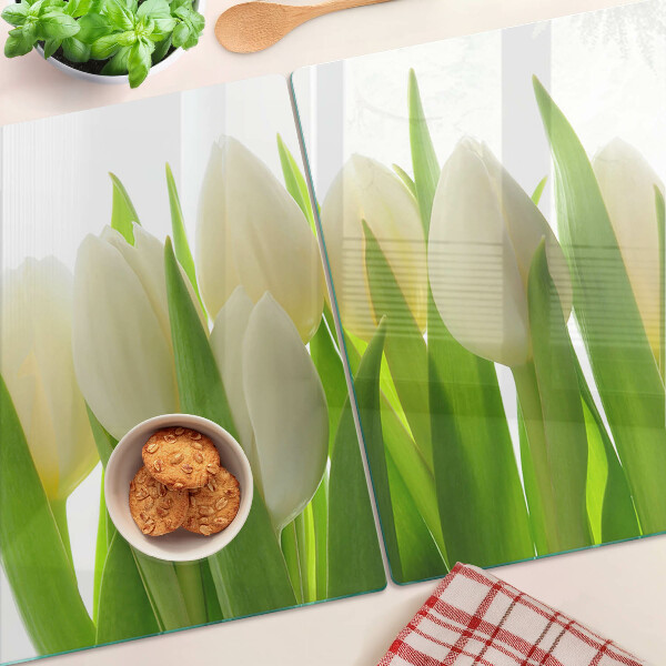 Üveg vágódeszka Tulipánok zöld levelek hátterében