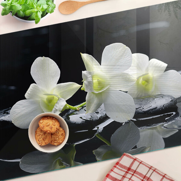 Edzett üveg vágódeszka Orchideák fekete háttéren