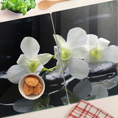Edzett üveg vágódeszka Orchideák fekete háttéren