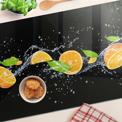 Üveg vágódeszka fényképpel Citrusfélék vízben