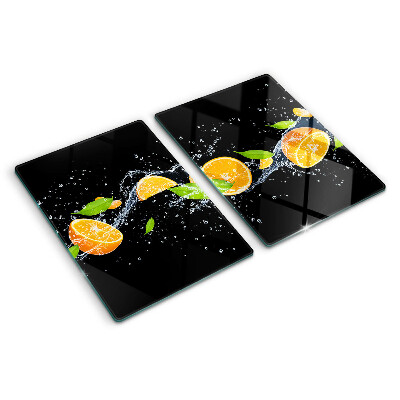 Üveg vágódeszka fényképpel Citrusfélék vízben