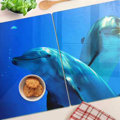 Üveg vágódeszka fényképpel Delfinek a vízben