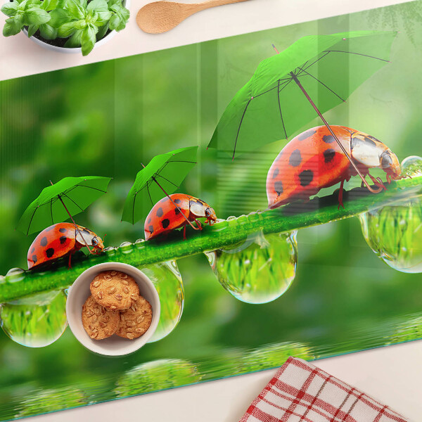 Üveg vágódeszka Katicabogarak a leveleken vízcseppekkel