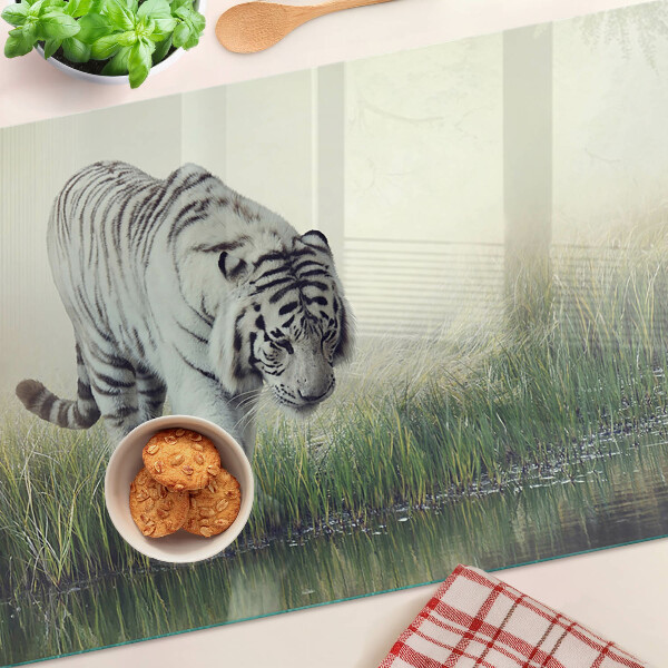 Üveg vágódeszka fényképpel Tigris a fűben