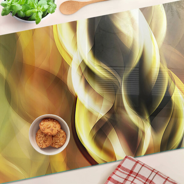 Üveg vágódeszka Absztrakt hullámok arany árnyalatokban