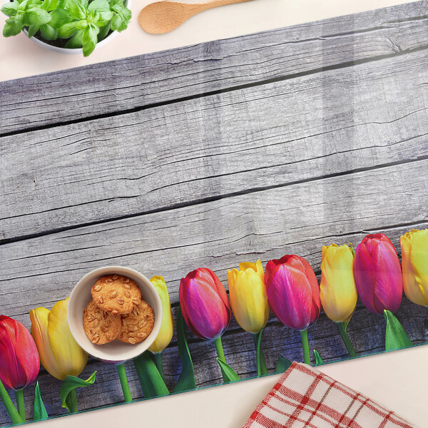 Üveg vágódeszka Tulipánok fa háttéren