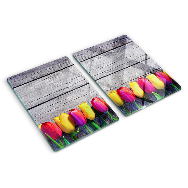 Üveg vágódeszka Tulipánok fa háttéren