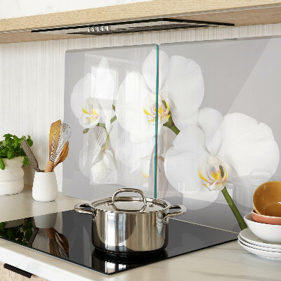 Üveg vágódeszka fényképpel Orchideák tükörkép háttér előtt