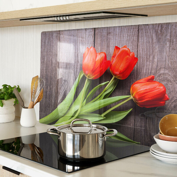 Üveg vágódeszka Tulipánok fa háttéren