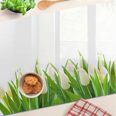 Üveg vágódeszka fényképpel Tulipánok a zöld fűben