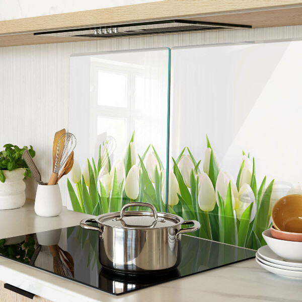 Üveg vágódeszka fényképpel Tulipánok a zöld fűben