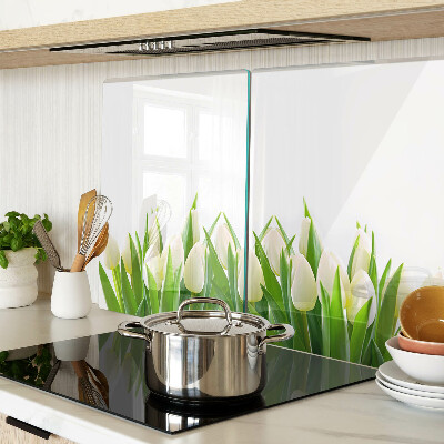 Üveg vágódeszka fényképpel Tulipánok a zöld fűben