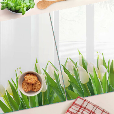 Üveg vágódeszka fényképpel Tulipánok a zöld fűben