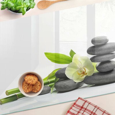 Üveg vágódeszka fényképpel Orchidea és spa kövek
