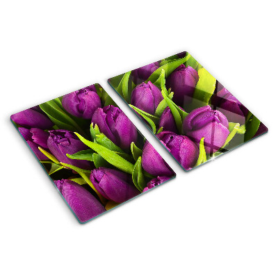 Üveg vágódeszka fényképpel Lila tulipánok zöld levelekkel