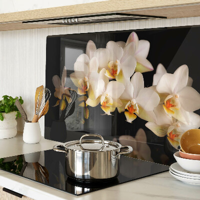 Edzett üveg vágódeszka Orchideák fekete háttéren