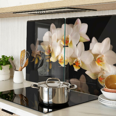 Edzett üveg vágódeszka Orchideák fekete háttéren