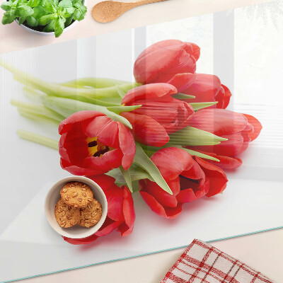 Üveg vágódeszka fényképpel Piros tulipánok fehér alapon