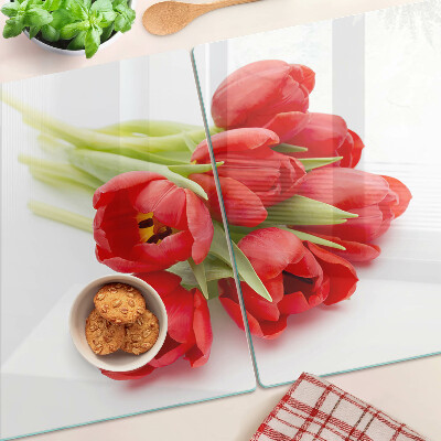 Üveg vágódeszka fényképpel Piros tulipánok fehér alapon