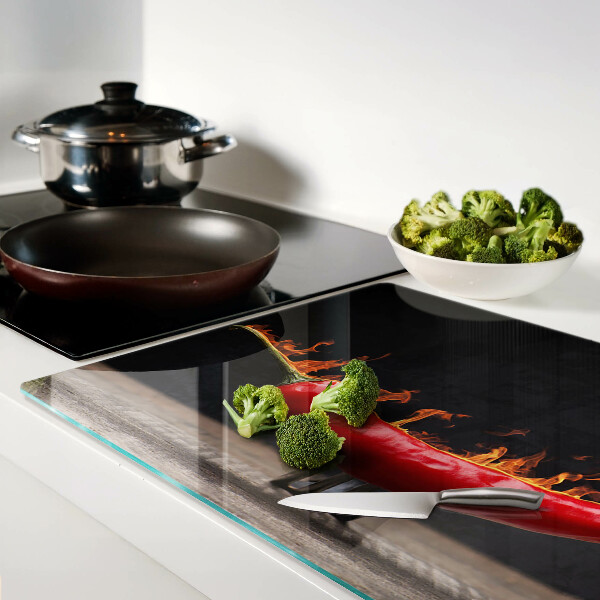 Üveg vágódeszka fényképpel Tűz és chili paprika