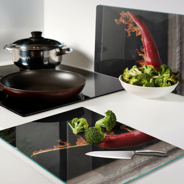 Üveg vágódeszka fényképpel Tűz és chili paprika