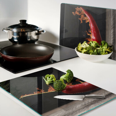 Üveg vágódeszka fényképpel Tűz és chili paprika