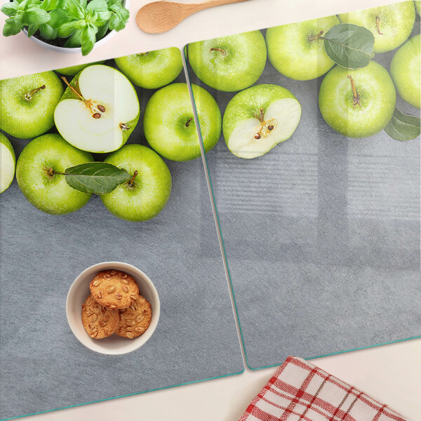 Üveg vágódeszka fényképpel Zöld alma szürke felületen