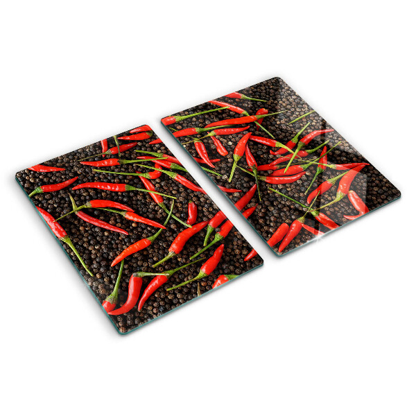 Üveg vágódeszka fényképpel Chili paprika fekete borssal