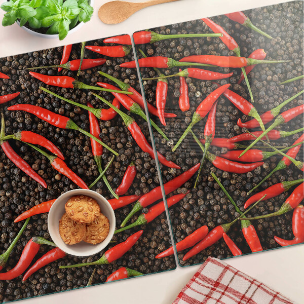 Üveg vágódeszka fényképpel Chili paprika fekete borssal