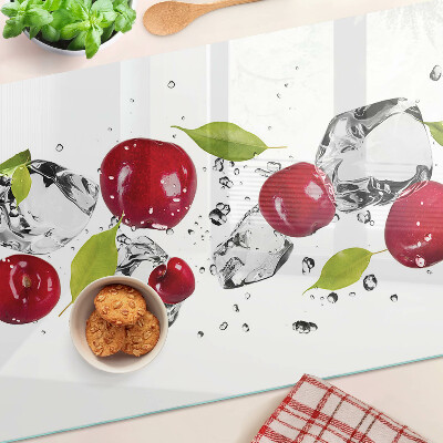 Üveg vágódeszka fényképpel Piros almák jéggel