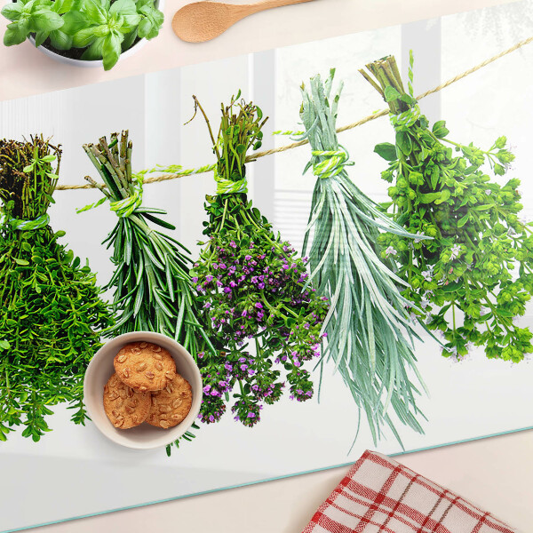 Üveg vágódeszka Szárított gyógynövények egy madzagon