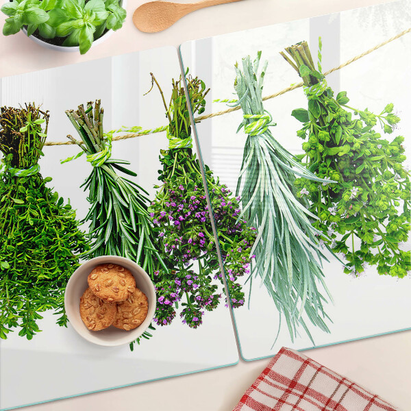 Üveg vágódeszka Szárított gyógynövények egy madzagon
