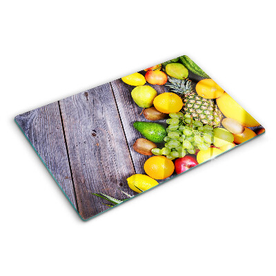 Üveg vágódeszka fényképpel Gyümölcsök fa háttéren