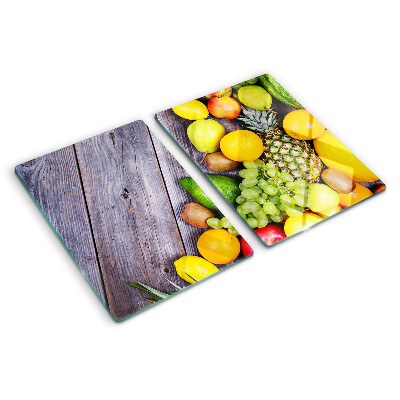 Üveg vágódeszka fényképpel Gyümölcsök fa háttéren