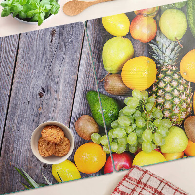 Üveg vágódeszka fényképpel Gyümölcsök fa háttéren