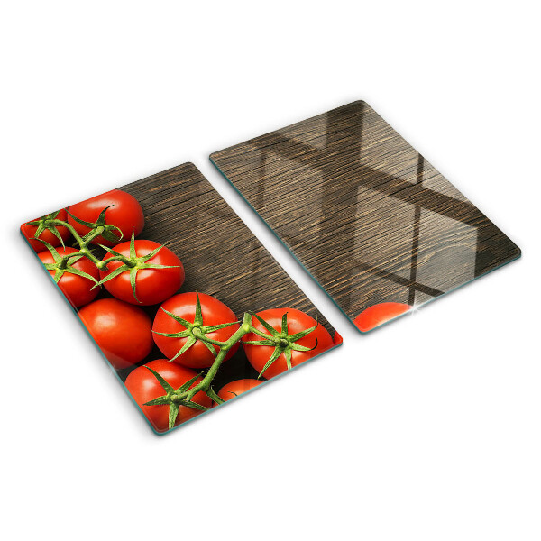 Üveg vágódeszka fényképpel Paradicsom fa háttéren