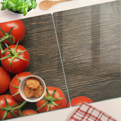 Üveg vágódeszka fényképpel Paradicsom fa háttéren