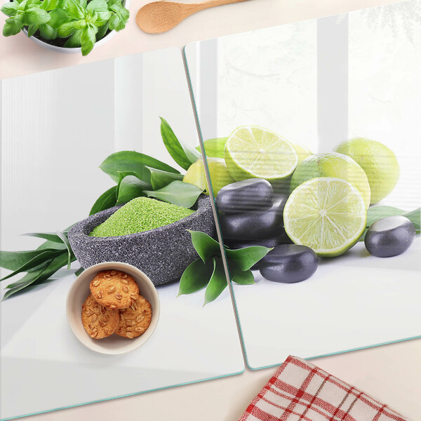 Edzett üveg vágódeszka Citrom és szőlő zöld háttéren