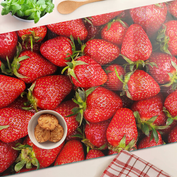 Üveg vágódeszka fényképpel Eper piros alapon