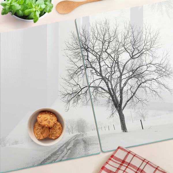 Üveg vágódeszka fényképpel Üres téli táj egy fával