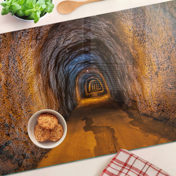 Üveg vágódeszka Egy alagút egy barlangban világítással