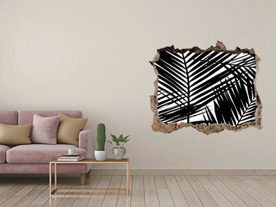 Fali matrica lyuk a falban Trópusi levelek egy lyukban a falban