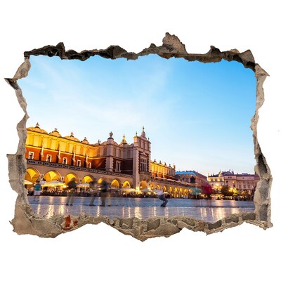 Fali matrica lyuk a falban Krakkó naplementekor