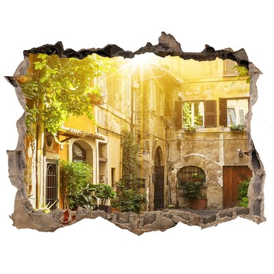 Fali matrica lyuk a falban Egy bájos udvar egy napsütötte városban