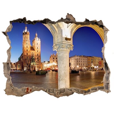 Fali matrica lyuk a falban Krakkó főtere éjszaka