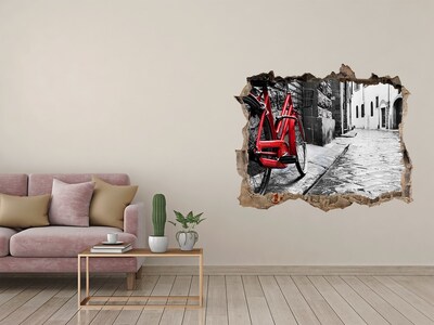 3d lyuk fal dekoráció Egy piros bicikli egy bájos utcában