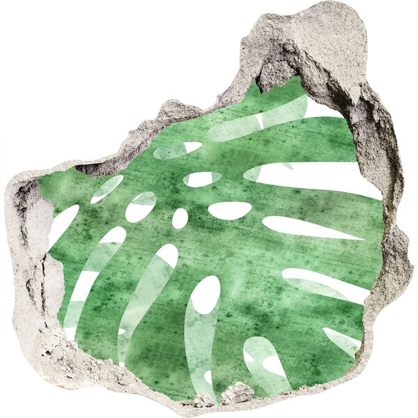 Fali matrica lyuk a falban Zöld levél egy sérült falon