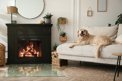 Téglalap alakú kandalló üveg alátét Trópusi levelek a háttérben