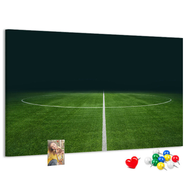 Nagy parafatábla Futballpálya vonalakkal és fűvel.